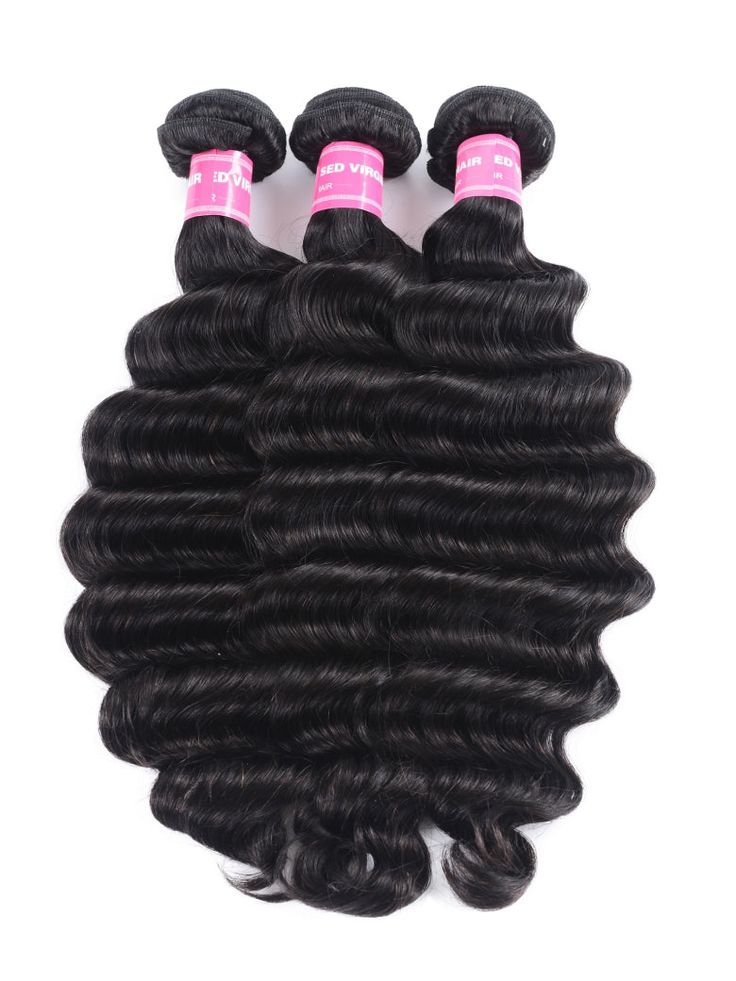 Hand holding a length of hair extension