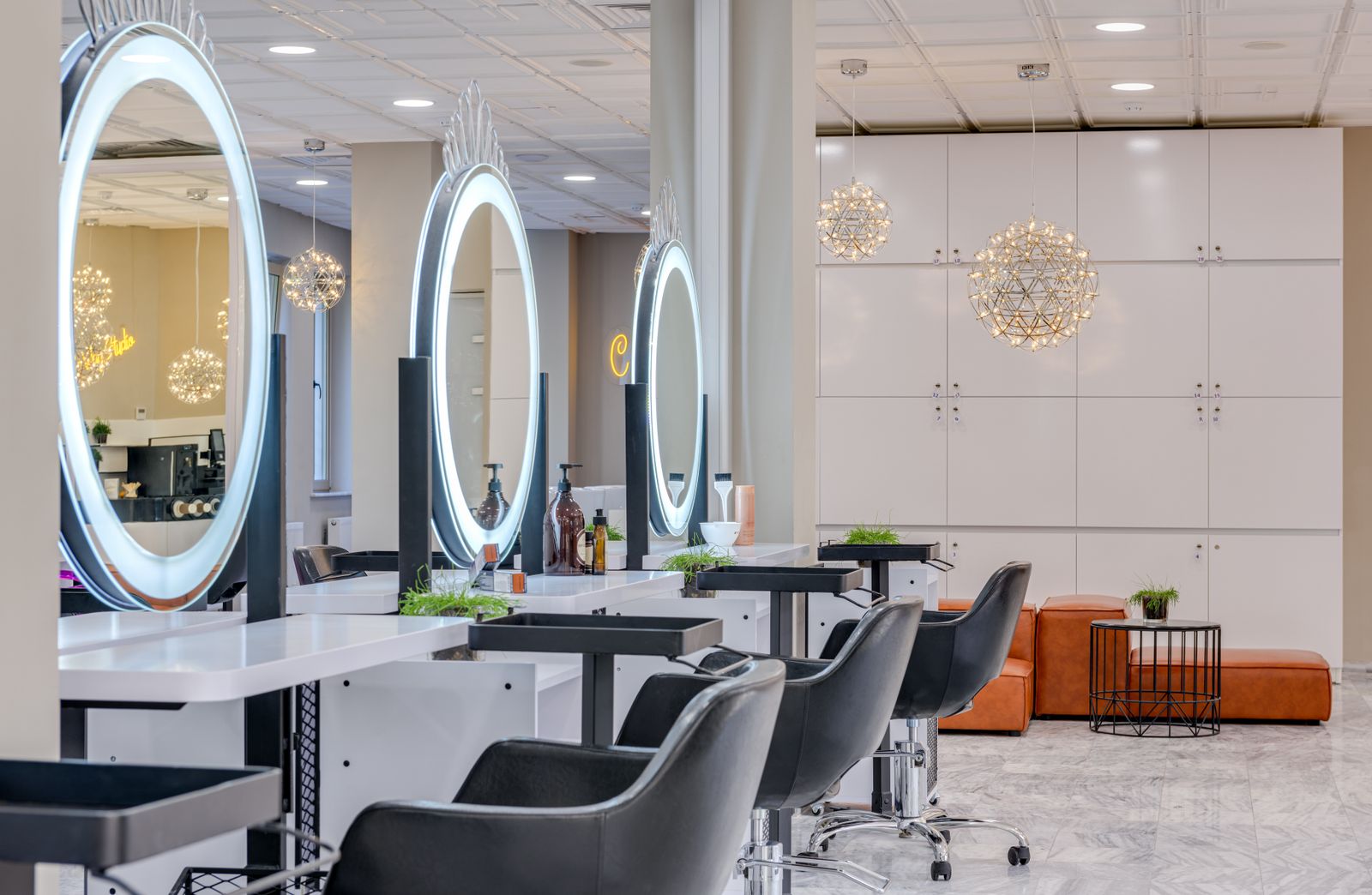 Interior of a modern professional beauty salon with styling stations
